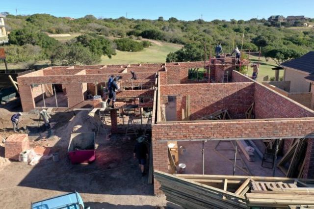 The roof trusses arrive on site, ready for placement